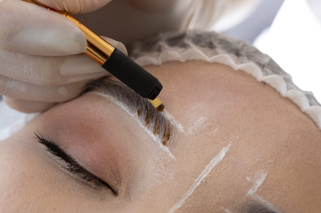 beautician-doing-microblading-procedure-client-s-eyebrows (1)